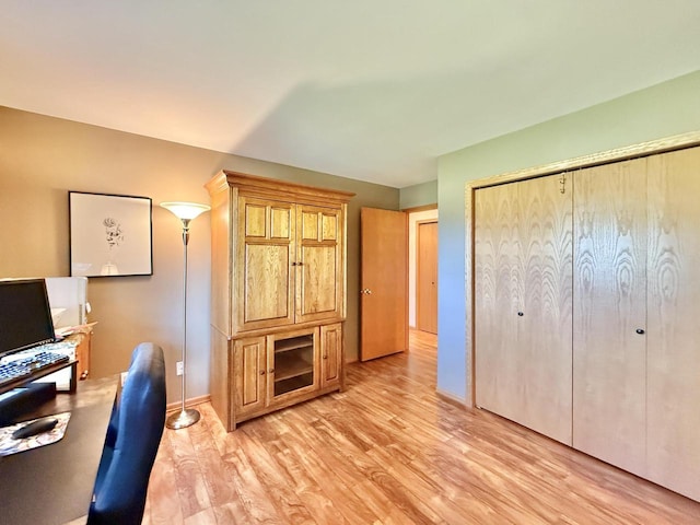 7975 Summit Dr, Delavan, WI 53115 - unfurnished office featuring light wood-style flooring and baseboards