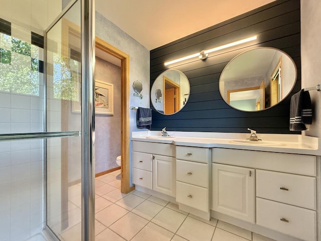 7975 Summit Dr, Delavan, WI 53115 - bathroom with tile patterned floors, double vanity, and a shower stall