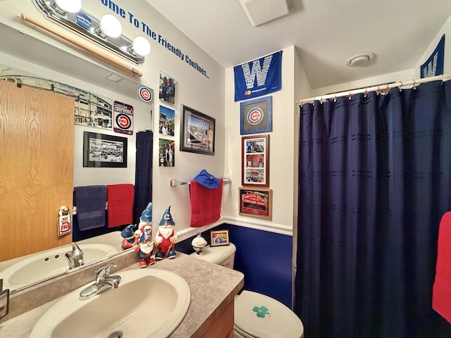 7975 Summit Dr, Delavan, WI 53115 - bathroom with vanity and a shower with shower curtain