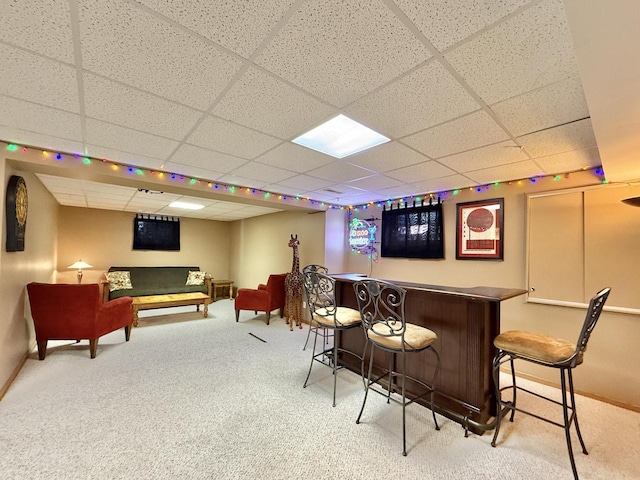 7975 Summit Dr, Delavan, WI 53115 - indoor dry bar with a drop ceiling and carpet flooring