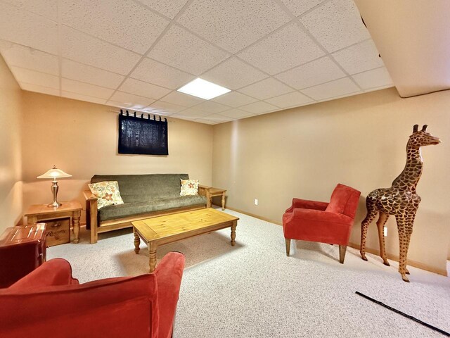7975 Summit Dr, Delavan, WI 53115 - carpeted living area with a paneled ceiling and baseboards