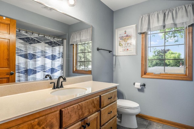 4474 N 107th St, Wauwatosa, WI 53225 - bathroom with vanity, curtained shower, and tile patterned floors