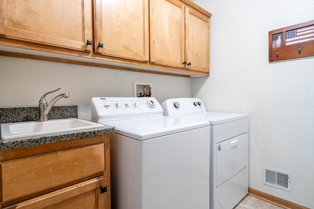 4474 N 107th St, Wauwatosa, WI 53225 - laundry area with washer and dryer and cabinet space