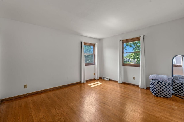 1512 David Ln, Waukesha, WI 53189 - spare room featuring light wood-type flooring