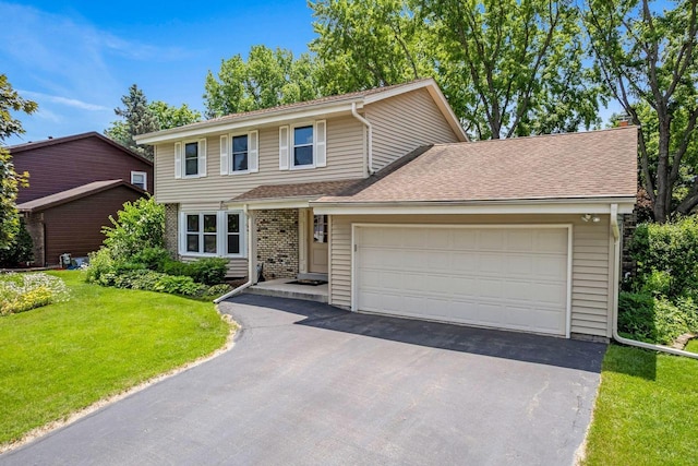 1512 David Ln, Waukesha, WI 53189 - view of front of home with asphalt driveway, a front yard, a garage, a chimney, and a shingled roof