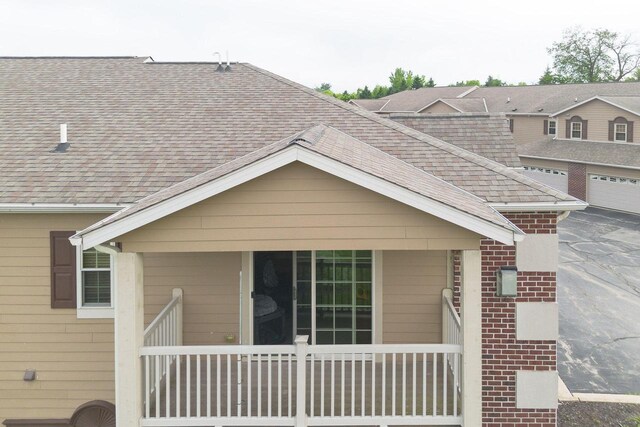W162S7013 Olive Cir, Muskego, WI 53150 - view of side of home featuring a shingled roof