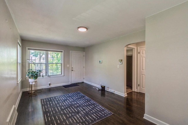 6421 W Girard Ave, Milwaukee, WI 53210 - foyer featuring arched walkways and wood finished floors