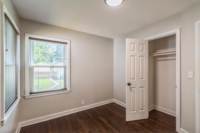 6421 W Girard Ave, Milwaukee, WI 53210 - unfurnished bedroom featuring dark wood-style flooring and a closet