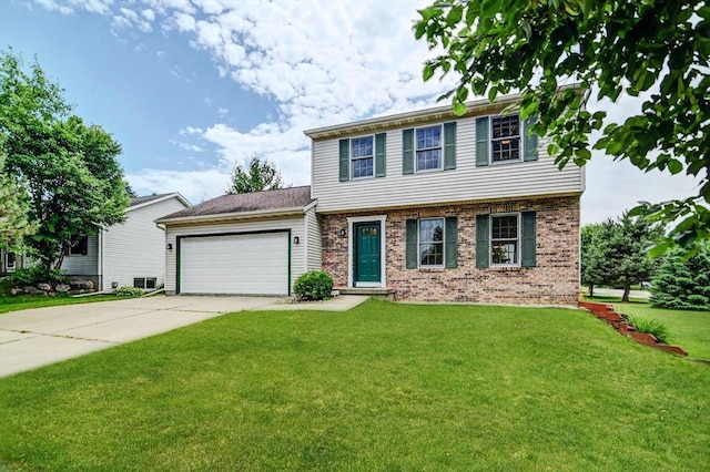 130 W Windsor Ave, Cottage Grove, WI 53527 - colonial home featuring a garage, concrete driveway, brick siding, and a front lawn