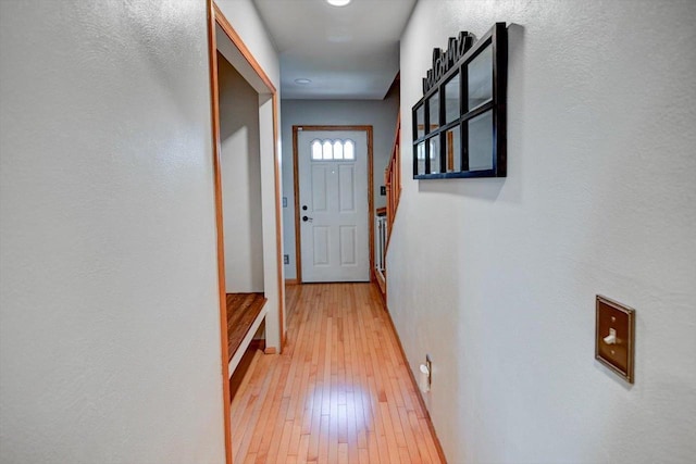 130 W Windsor Ave, Cottage Grove, WI 53527 - doorway to outside with light wood-style flooring and baseboards
