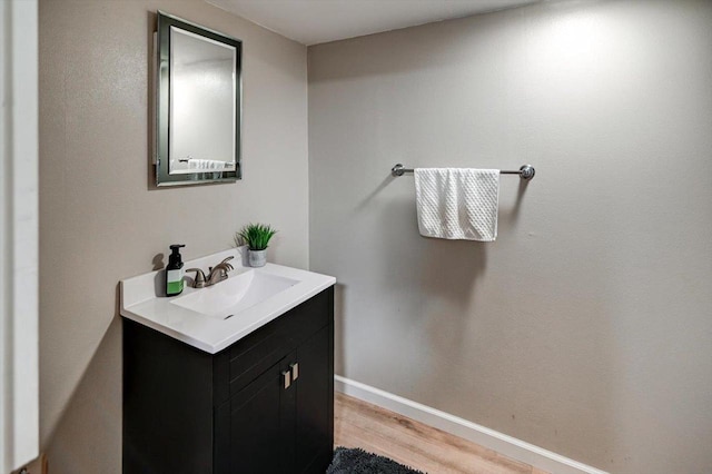 130 W Windsor Ave, Cottage Grove, WI 53527 - bathroom featuring vanity and wood finished floors