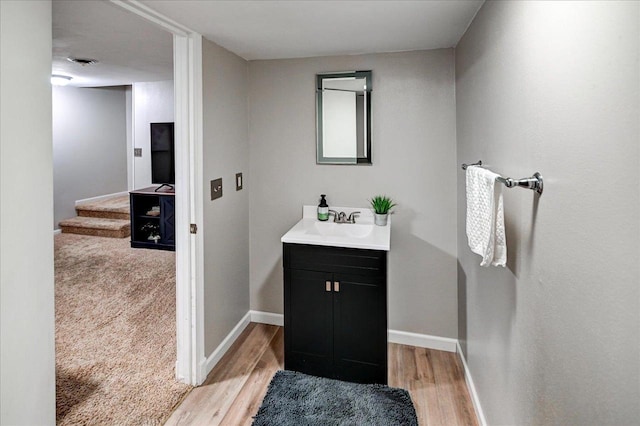 130 W Windsor Ave, Cottage Grove, WI 53527 - bathroom with vanity and wood finished floors