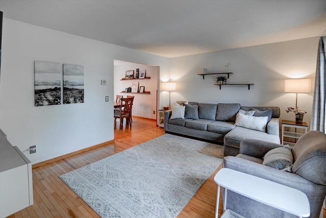 130 W Windsor Ave, Cottage Grove, WI 53527 - living room with light wood-style flooring and baseboards