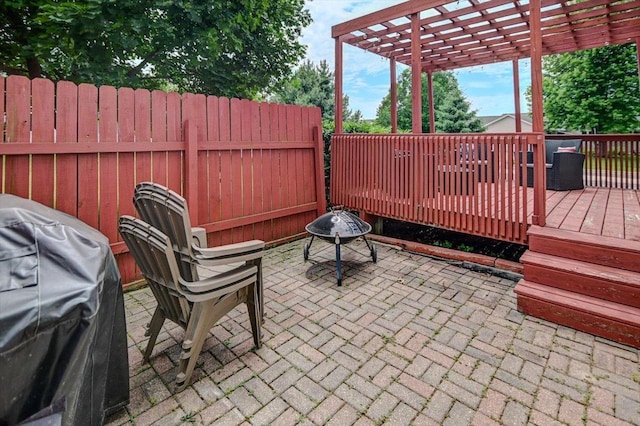 130 W Windsor Ave, Cottage Grove, WI 53527 - view of patio with a deck, a pergola, an outdoor fire pit, and area for grilling