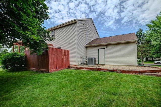 130 W Windsor Ave, Cottage Grove, WI 53527 - rear view of house featuring a yard and a patio area
