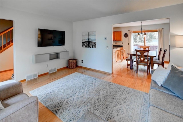 130 W Windsor Ave, Cottage Grove, WI 53527 - living room with stairway and light wood-type flooring