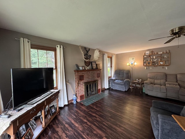 34 Elm Street N, St, La Crescent, MN 55947 - living room featuring wood finished floors, ceiling fan, healthy amount of natural light, and a brick fireplace