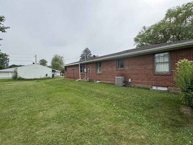 34 Elm Street N, St, La Crescent, MN 55947 - back of house with brick siding and a yard