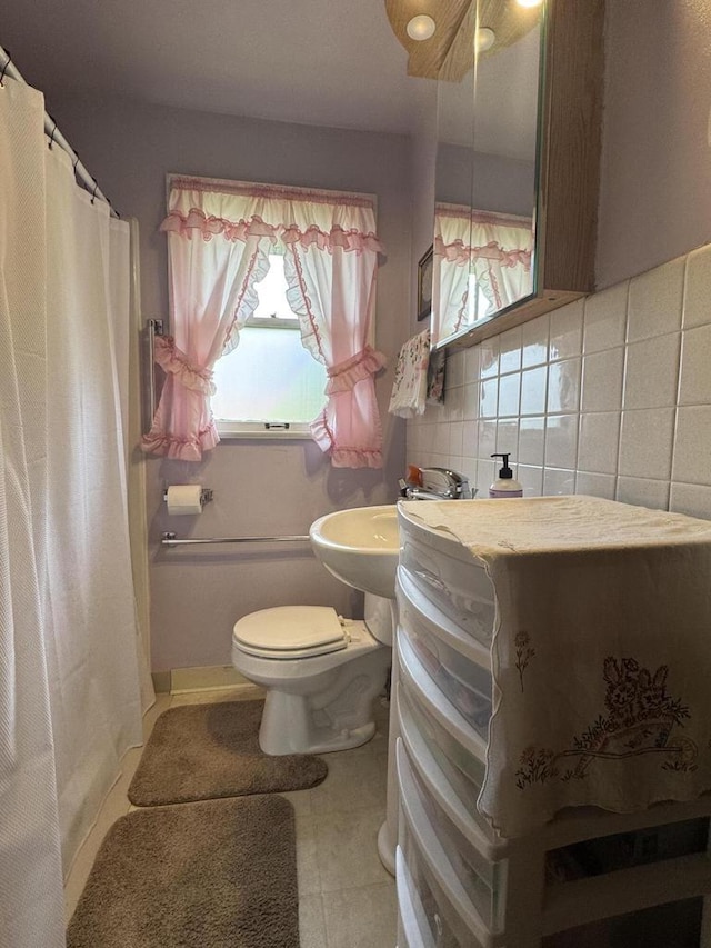 34 Elm Street N, St, La Crescent, MN 55947 - bathroom with tasteful backsplash, tile patterned flooring, and a shower with shower curtain