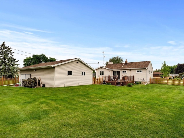 3715 N 17th St, Sheboygan, WI 53083 - rear view of property featuring a deck and a chimney