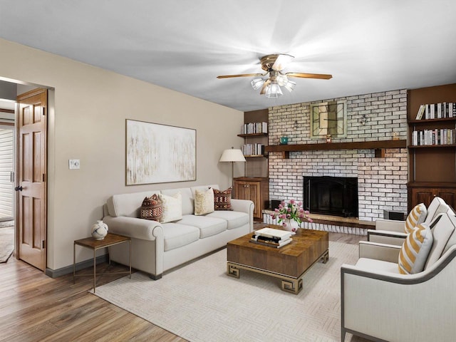 3715 N 17th St, Sheboygan, WI 53083 - living area featuring ceiling fan, wood finished floors, and a brick fireplace