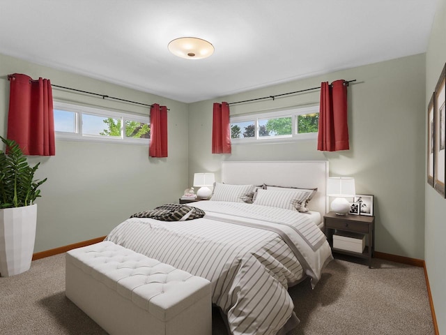 3715 N 17th St, Sheboygan, WI 53083 - carpeted bedroom featuring multiple windows