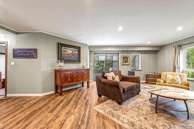 1450 Weber Ct, Hartland, WI 53029 - living area with wood finished floors, crown molding, and recessed lighting