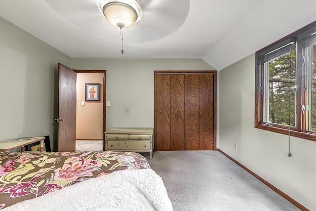 1450 Weber Ct, Hartland, WI 53029 - carpeted bedroom with a closet, lofted ceiling, and a ceiling fan
