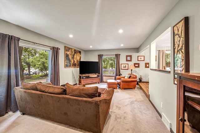 1450 Weber Ct, Hartland, WI 53029 - living room featuring light colored carpet and recessed lighting