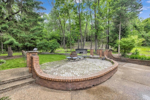 1450 Weber Ct, Hartland, WI 53029 - view of patio with a fire pit