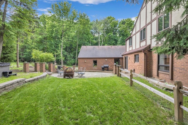 1450 Weber Ct, Hartland, WI 53029 - view of yard featuring a fire pit and a patio area