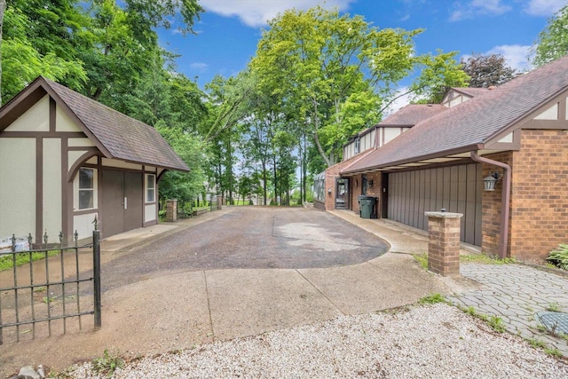 1450 Weber Ct, Hartland, WI 53029 - view of concrete driveway