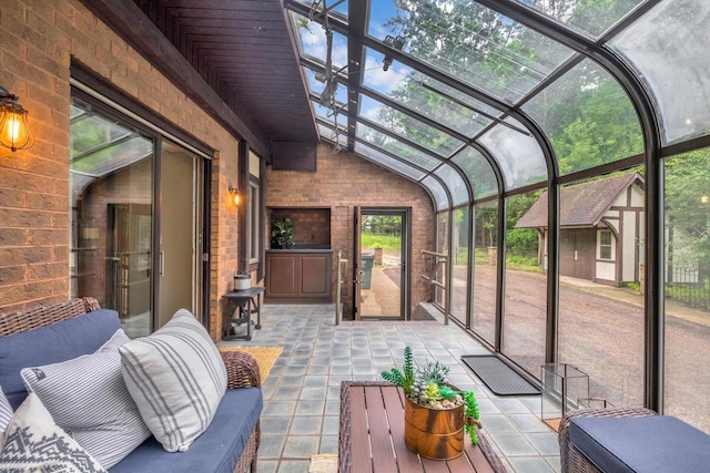 1450 Weber Ct, Hartland, WI 53029 - sunroom featuring vaulted ceiling