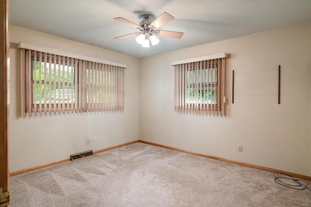 3720 Elm Dr, La Crosse, WI 54601 - empty room featuring carpet floors and ceiling fan