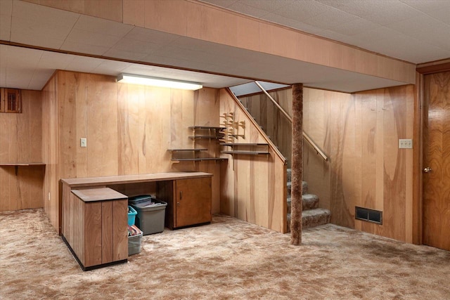 3720 Elm Dr, La Crosse, WI 54601 - finished basement featuring carpet floors, wooden walls, and stairway