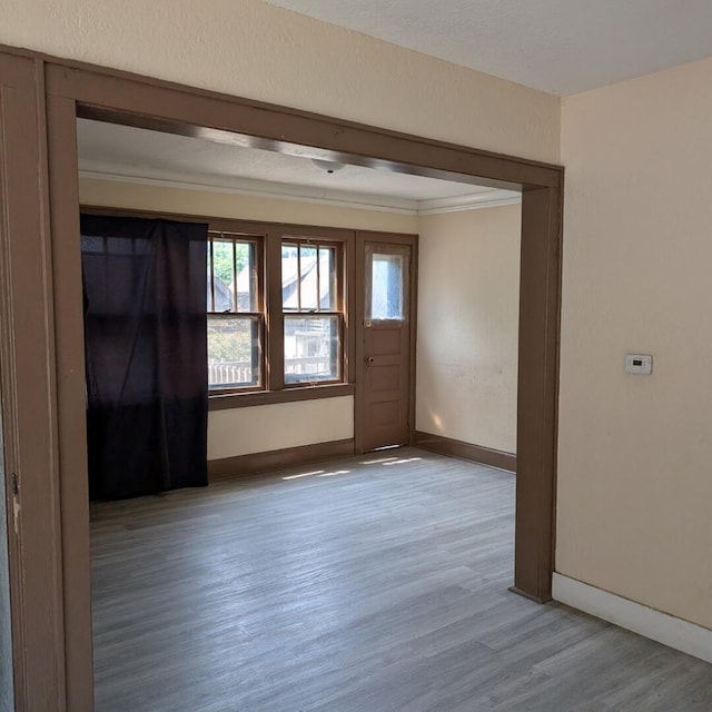1920 W Vienna Ave, Milwaukee, WI 53206 - entrance foyer with wood finished floors and ornamental molding