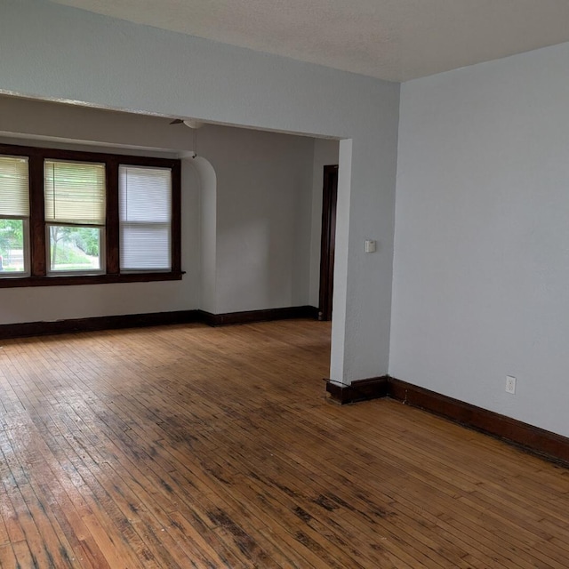 1920 W Vienna Ave, Milwaukee, WI 53206 - spare room featuring wood-type flooring and ceiling fan