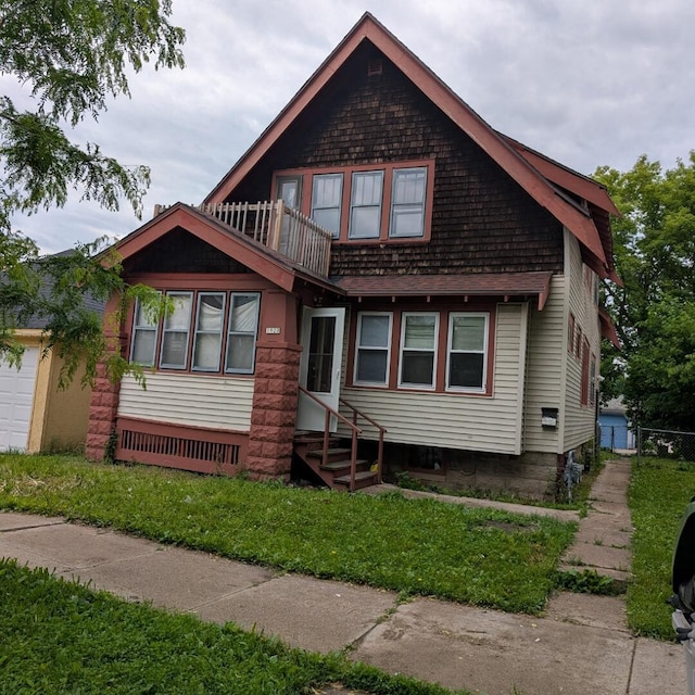 1920 W Vienna Ave, Milwaukee, WI 53206 - view of front facade with a balcony and entry steps