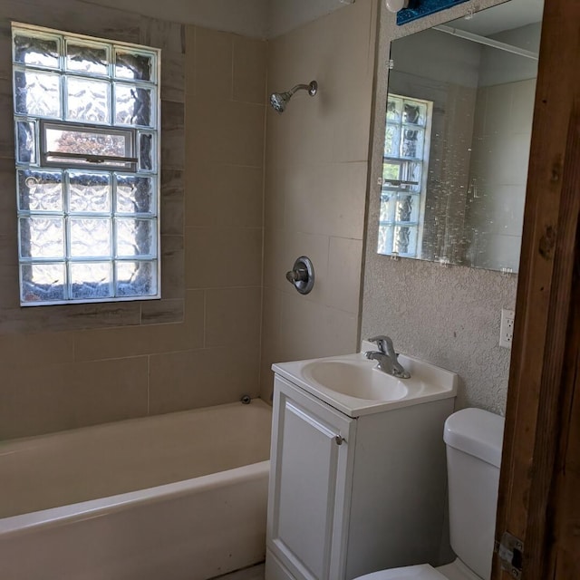 1920 W Vienna Ave, Milwaukee, WI 53206 - bathroom featuring vanity and bathing tub / shower combination