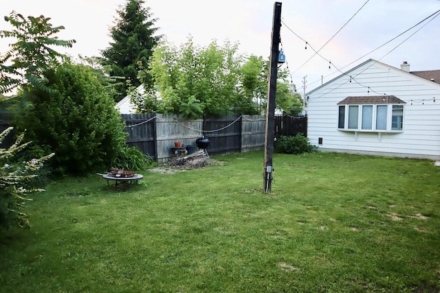 2218 Jerome Blvd, Racine, WI 53403 - view of yard with a fire pit