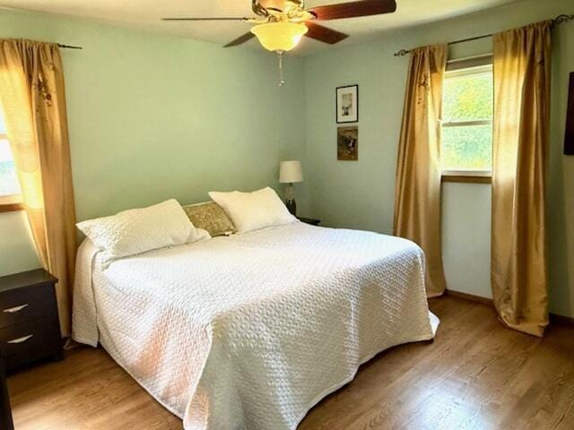 W254S6620 Ridge Rd, Waukesha, WI 53189 - bedroom featuring light wood-type flooring and ceiling fan