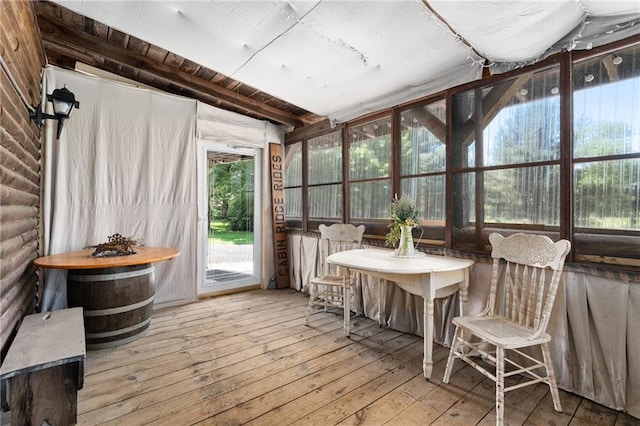 4271 220th St, Cadott, WI 54727 - sunroom featuring hardwood / wood-style flooring, a wooden deck, and a wood ceiling with exposed beams