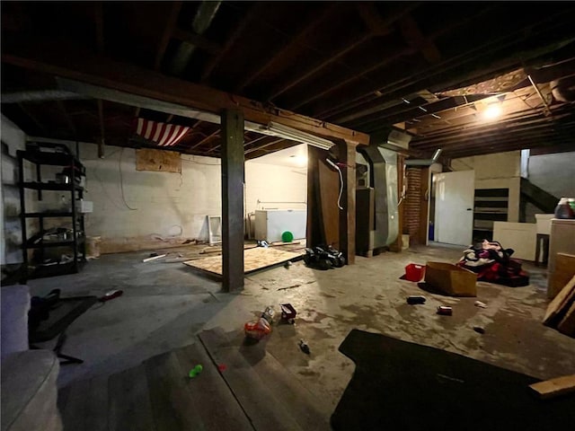306 E Race Ave, Elmwood, WI 54740 - unfinished basement featuring washer / clothes dryer