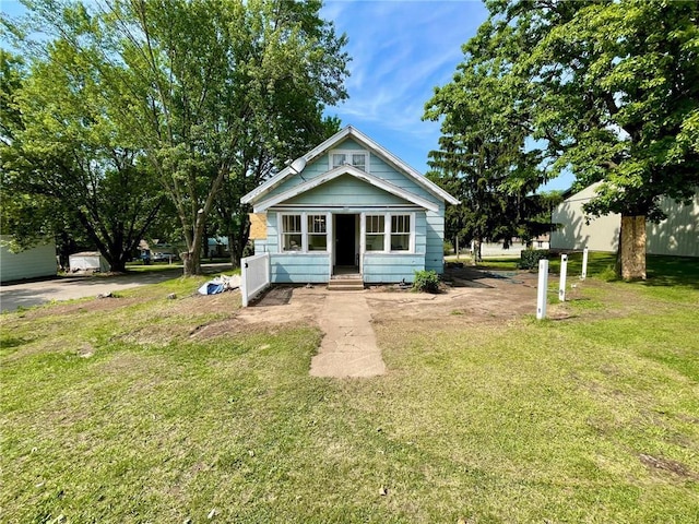 306 E Race Ave, Elmwood, WI 54740 - view of front of property with a front yard