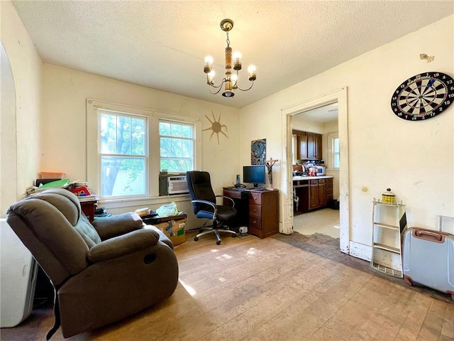 306 E Race Ave, Elmwood, WI 54740 - office area with a chandelier, a textured ceiling, and arched walkways