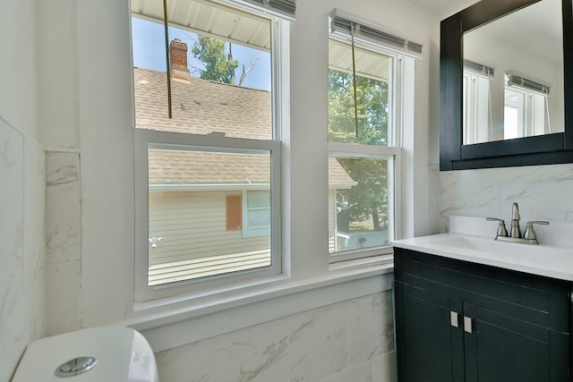 1541 Porter Ave, Beloit, WI 53511 - bathroom featuring vanity and backsplash