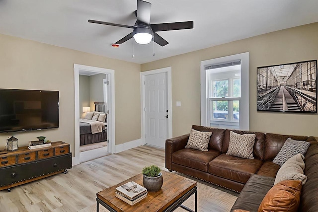 1541 Porter Ave, Beloit, WI 53511 - living room with light wood-style flooring and a ceiling fan