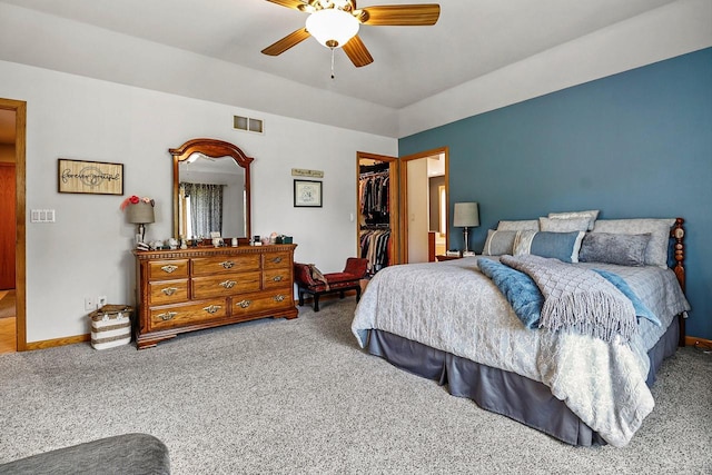 6320 10th Pl, Kenosha, WI 53144 - bedroom with carpet, a closet, a walk in closet, and a ceiling fan