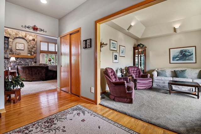 6320 10th Pl, Kenosha, WI 53144 - living room featuring plenty of natural light, wood finished floors, a fireplace, and vaulted ceiling