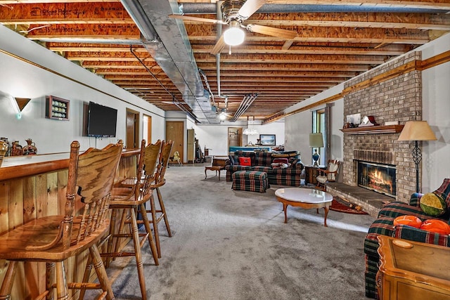 6320 10th Pl, Kenosha, WI 53144 - basement featuring carpet flooring, a ceiling fan, and a fireplace